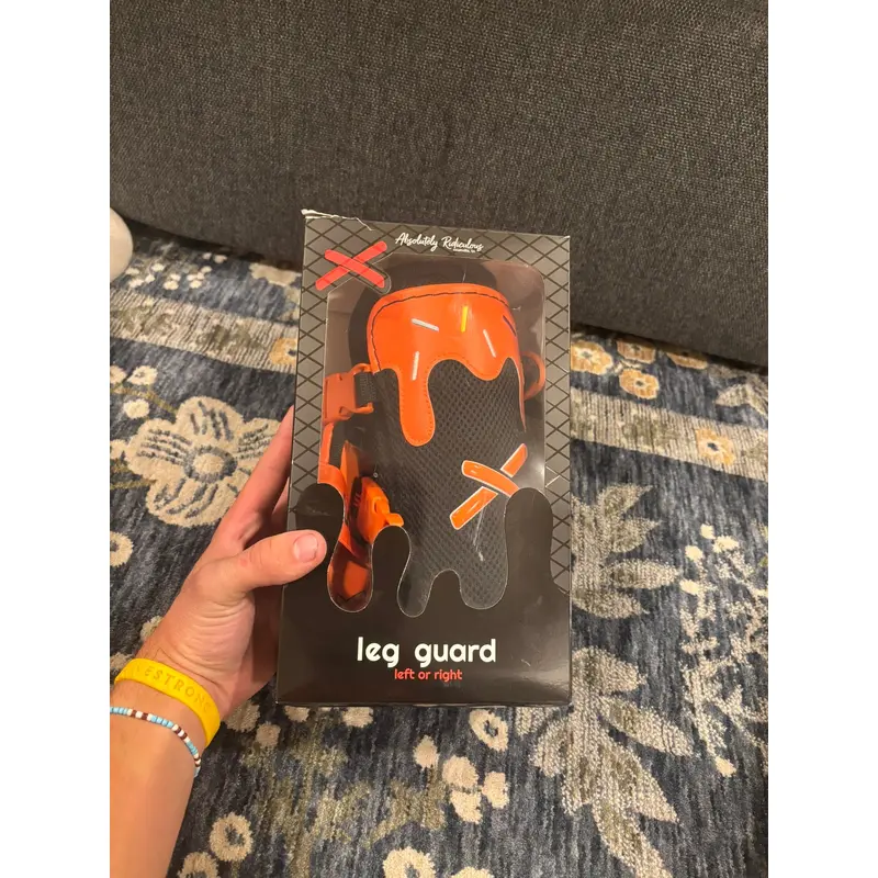 Black and orange Senior leg guard
