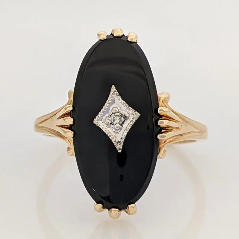 10K ONYX OVAL 8X17 WITH MELEE ESTATE RING 3.0 GRAMS