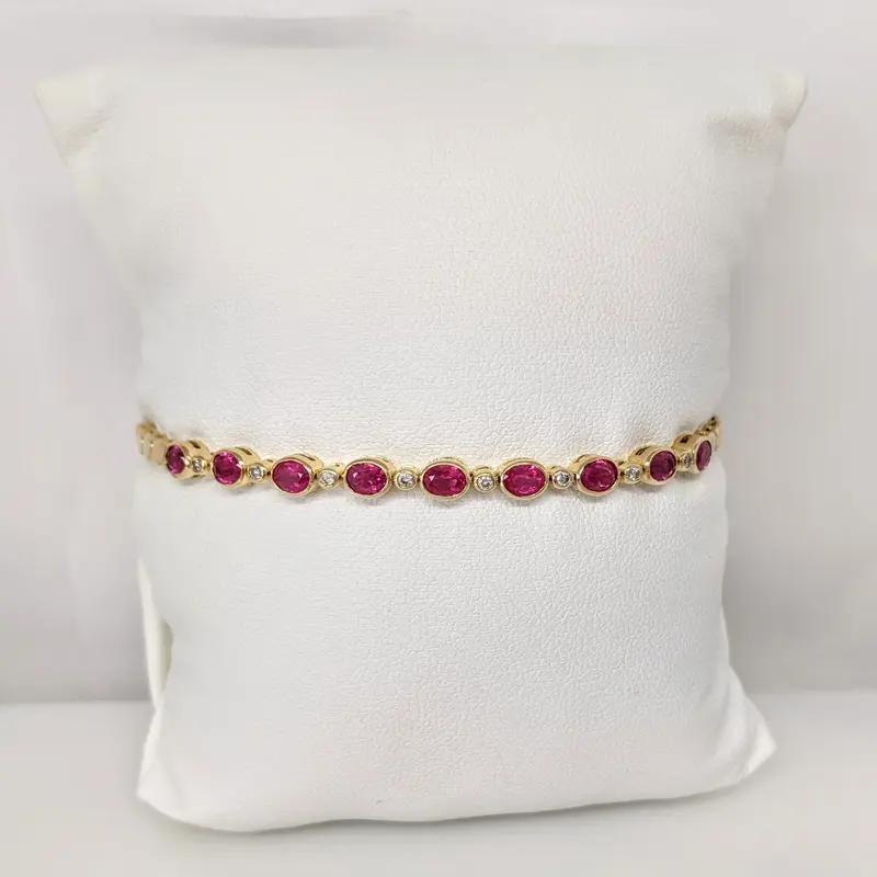 14K RUBY OVAL 3X4 (9) WITH .12 DIAMOND TOTAL WEIGHT ESTATE BRACELET 8.0 GRAMS