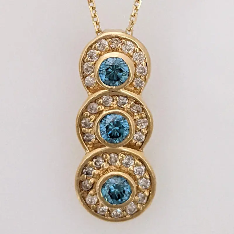 14K .65 CARAT TOTAL WEIGHT I1-I2 BLUE (3) WHITE (29) BEZEL ESTATE PENDANT & CHAIN 3.6 GRAMS
