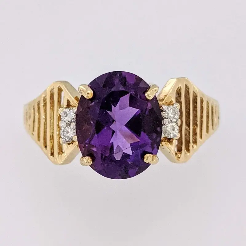14K AMETHYST OVAL 8X10 WITH (4) MELEE OPEN LINE ESTATE RING 3.1 GRAMS