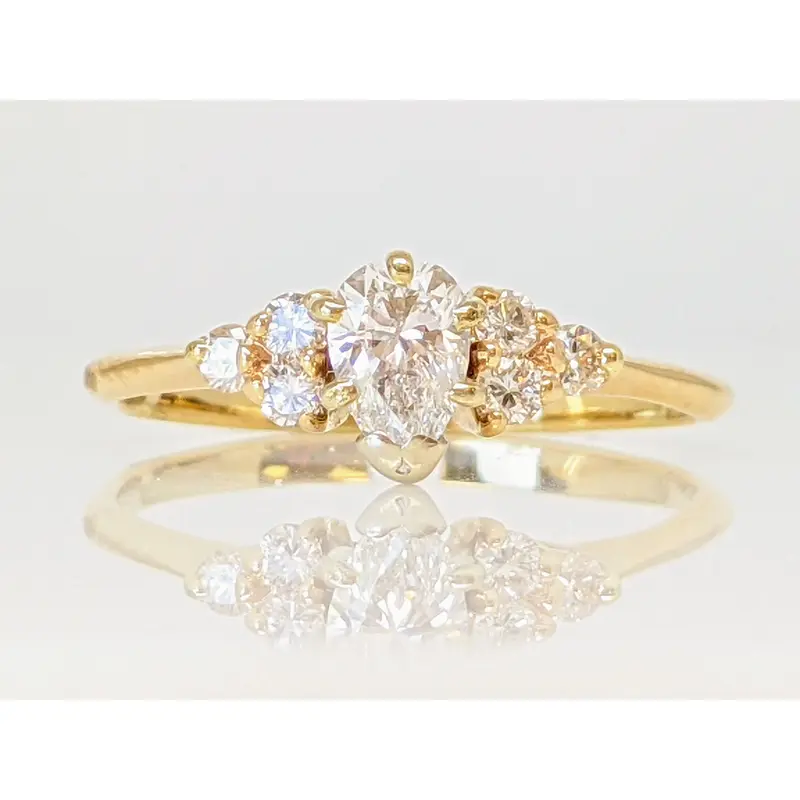 14K .50 CARAT TOTAL WEIGHT SI2 G DIAMOND PEAR WITH (6) ROUND ESTATE RING 2.0 GRAMS